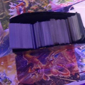 700 pokemom card!all different types I don’t know to much but I know they sell